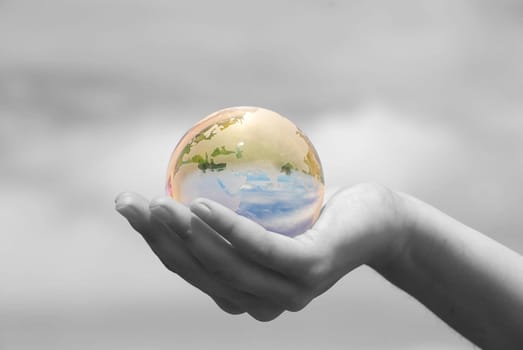 globe on the human hand