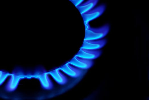 flames of gas stove in the dark