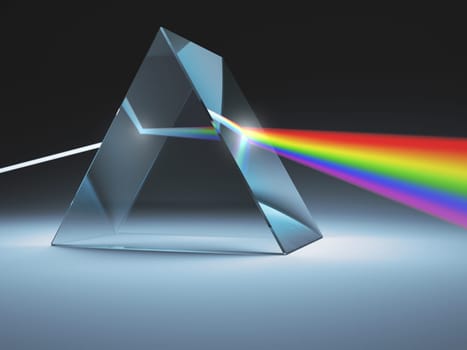 The crystal prism disperses white light into many colors.