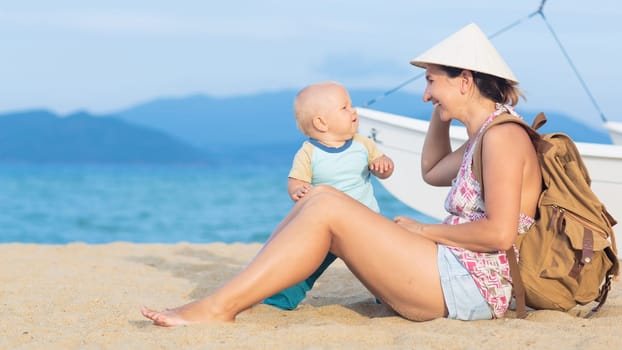 Baby and mother outdoor portrait