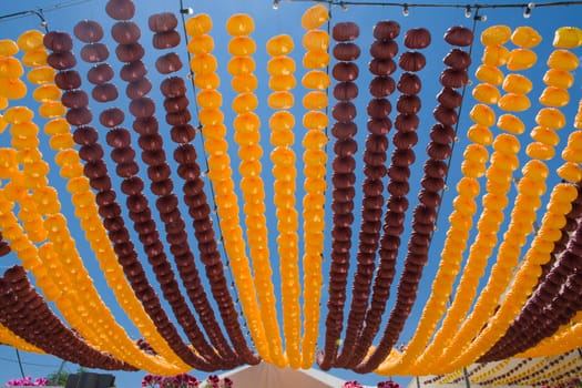 Blue Sky full of colorful paper Lanterns, Cordoba fair, Spain