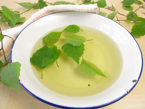 Bath tea with birch leaves