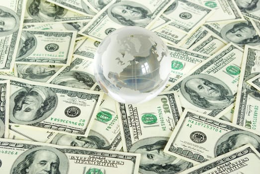 globe isolated on a dollars background