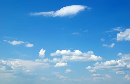 blue sky with clouds and sun