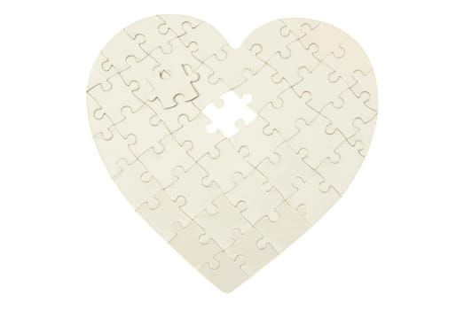 heart made from the puzzle on white