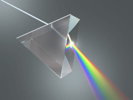 The crystal prism disperses white light into many colors.