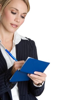 Pretty business woman writing check