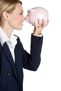 Beautiful woman holding piggy bank