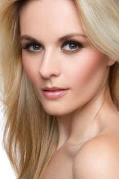 Beautiful blond woman face closeup