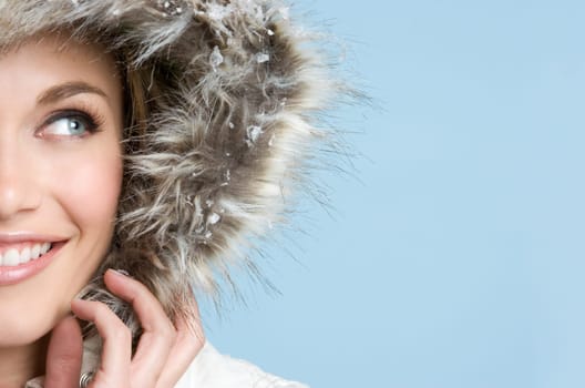 Smiling woman wearing winter coat