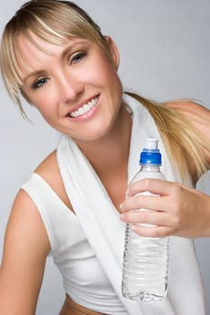 Resting woman holding water bottle