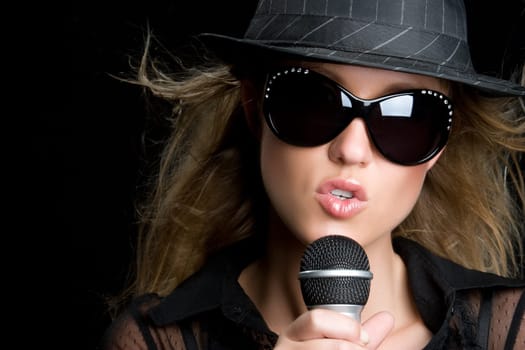 Beautiful popstar woman singing
