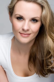 Beautiful smiling blond woman closeup