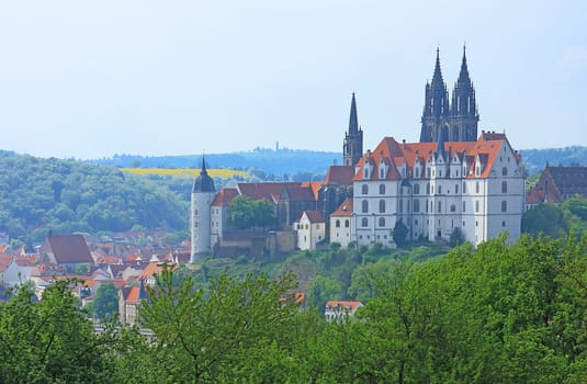 right: Albrechtsburg Meissen,to the left of it the round tower of the former bishop's castle (today district court),behind it the towers of the cathedral. Saxony. Germany.