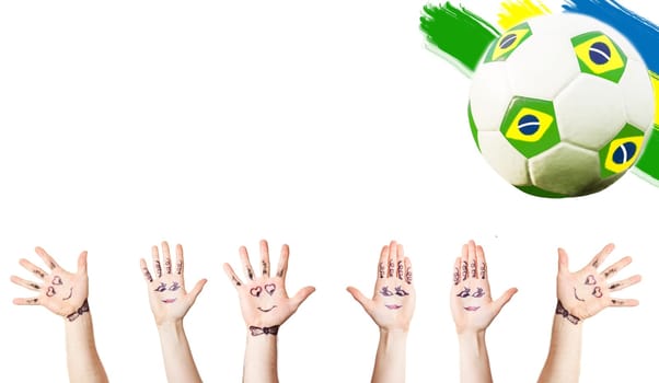 Cheering hands, soccer ball and the colors of the  Brazil flag