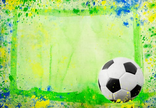 Photo of soccer ball and the colors of the Brazil flag