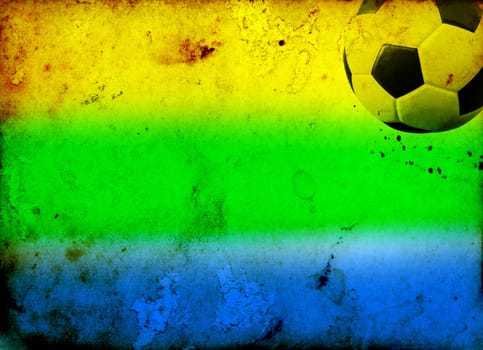 Photo of soccer ball and the colors of the Brazil flag