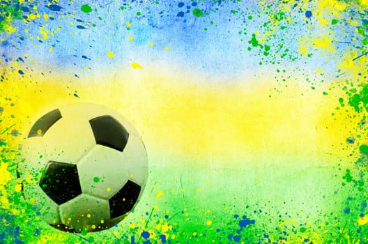 Photo of soccer ball and the colors of the Brazil flag