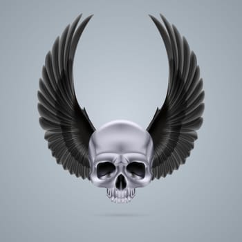 Metal chrome skull with two raised crow wings and no jaw bone.