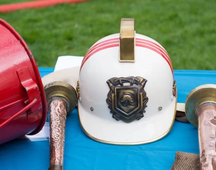 antique firefighter helmet on a table