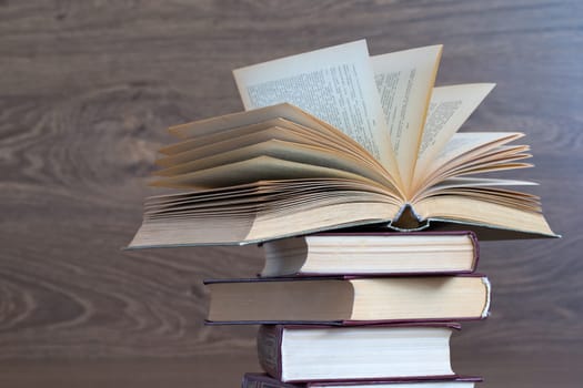books on a wooden background
