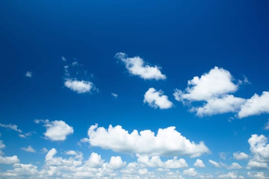 blue sky background with tiny clouds..