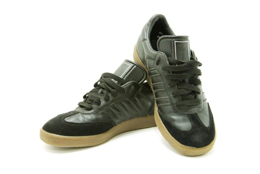 A pair of men's running shoes on white