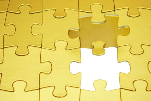 gold puzzles for background. business concept