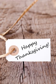 A Natural Looking Background with Label with Happy Thanksgiving on it