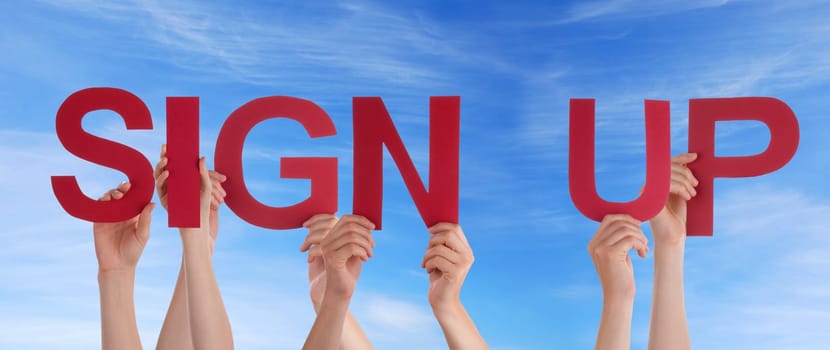 hands holding four pieces of a puzzle with copy space, gray background