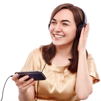 Young woman listening to the music from a smart phone