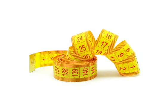 Measuring tape of the tailor on white