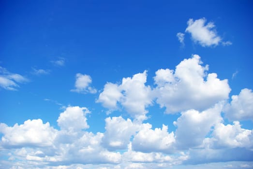 Blue sky background with a tiny clouds