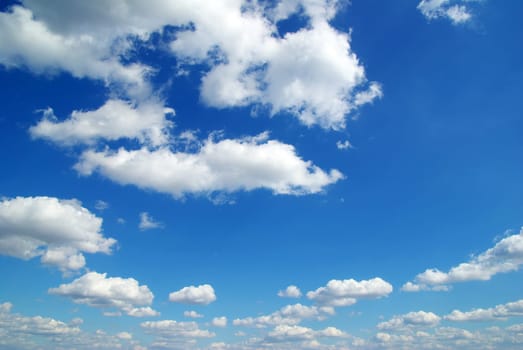 Blue sky background with a tiny clouds