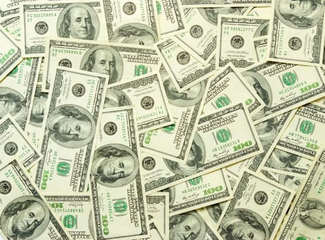 american dollars arranged at the background