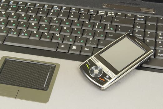 mobile isolated on a laptop