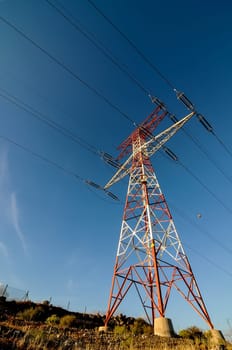 Energy Electricity Power Pylon on a Blue Sky