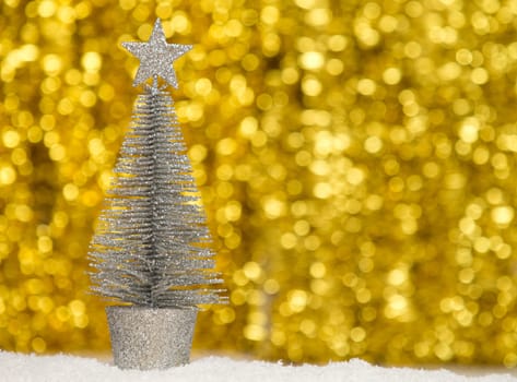 Decorative Christmas tree isolated on bokeh background