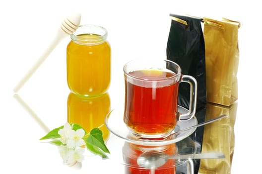 Tea being poured into glass tea cup