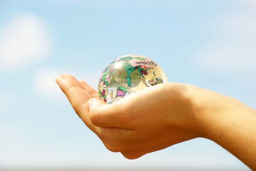 globe on the human hand