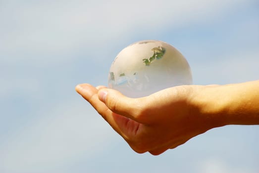 globe on the human hand