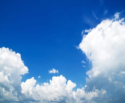 blue sky with clouds and sun