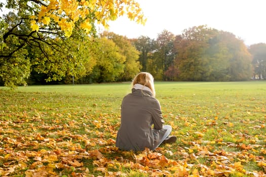 lonely young woman in the park