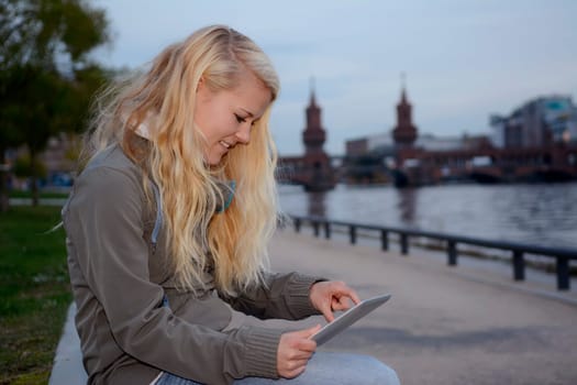 young woman with tablet computer