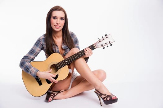 Beautiful Young Adult Woman Modeling on Set for An Album Cover
