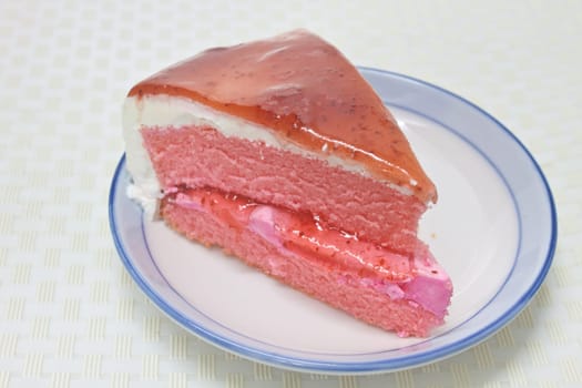 Dessert Strawberry cheesecake in plate on background