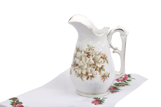 Old flower vase on cloth