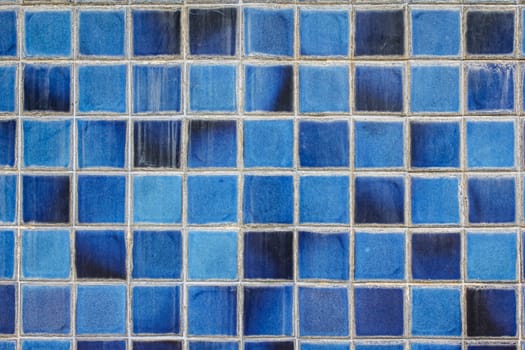 blue ceramic wall tiles and details of surface