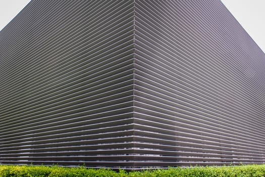 texture of steel ventilation grille on the wall of a building