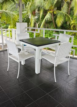 Outdoors white chair and table